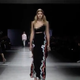 Illustration for article titled Gigi Hadid's Boob Popped Out to Say 'Yolanda' While Walking 'Literally the Longest Runway'